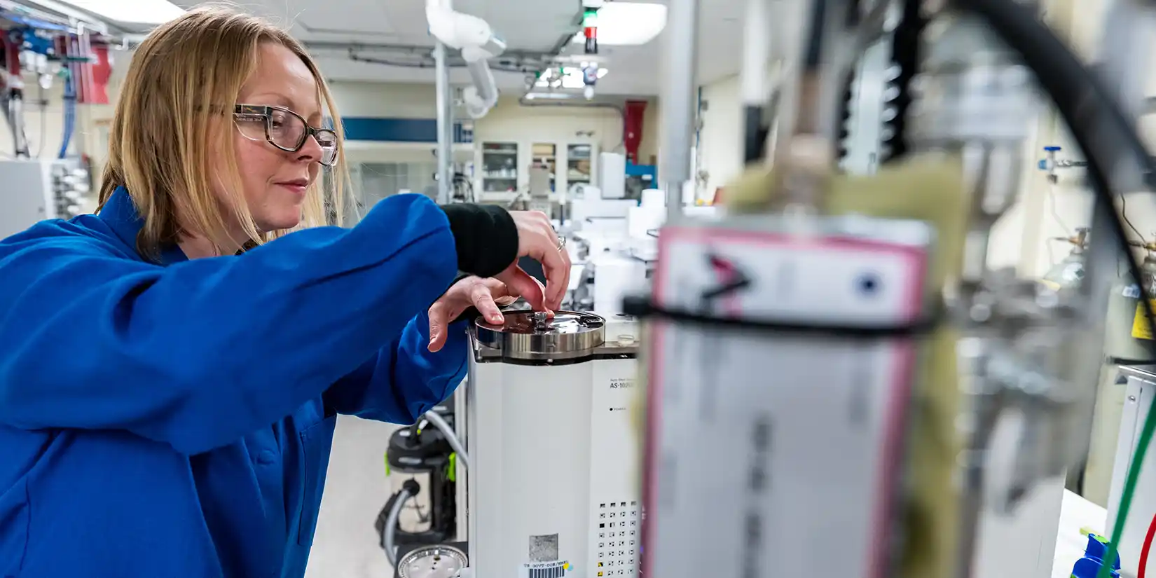 biomass-bioproduct-characterization-79655 A researcher operates a high throughput pyrolysis molecular beam mass spectrometer.