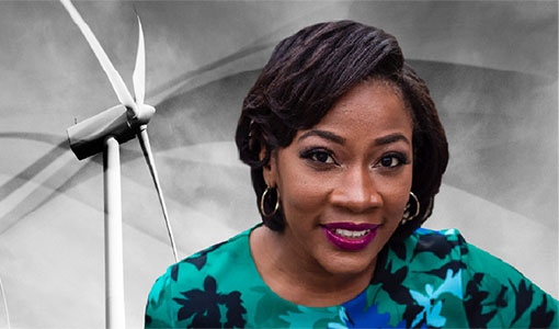 20240219-behind-the-blade-angel-mccoy-news Angel McCoy in front of wind turbine blades
